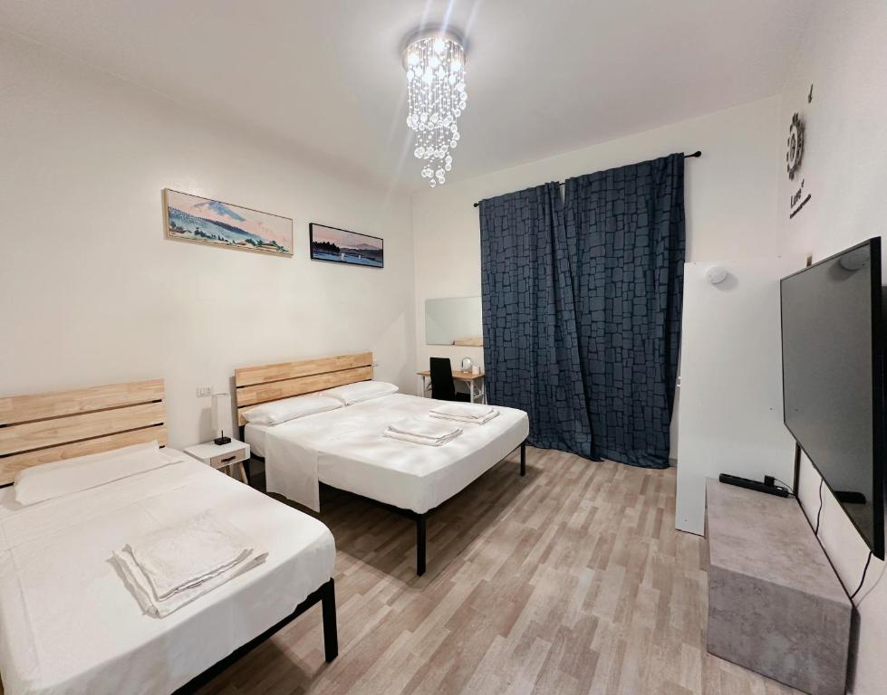 Postel nebo postele na pokoji v ubytování BED & BREAKFAST SAKURA