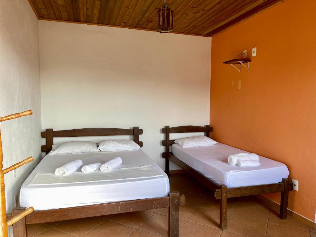 Postel nebo postele na pokoji v ubytování Guava Hostel Serra Grande