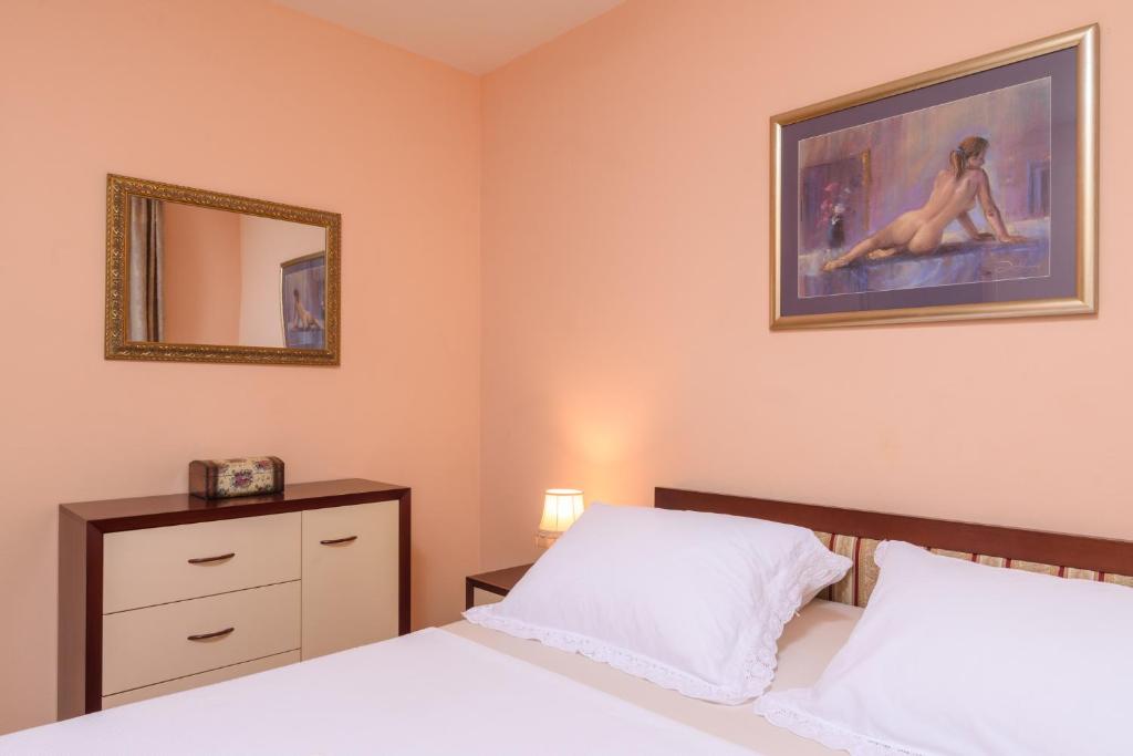 Posteľ alebo postele v izbe v ubytovaní Apartments Jozic
