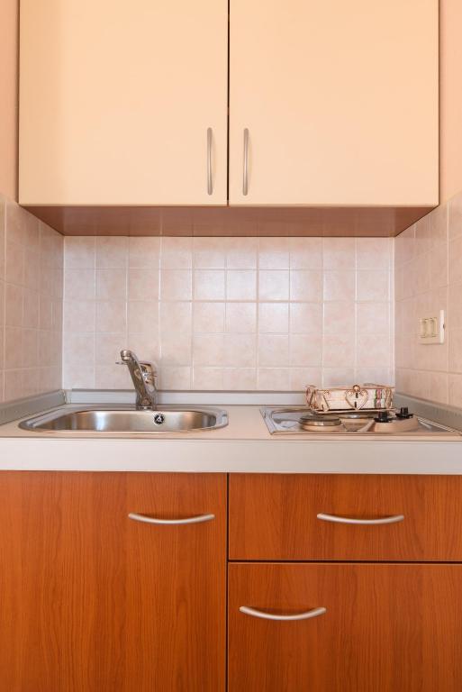 Kuchyňa alebo kuchynka v ubytovaní Apartments Jozic