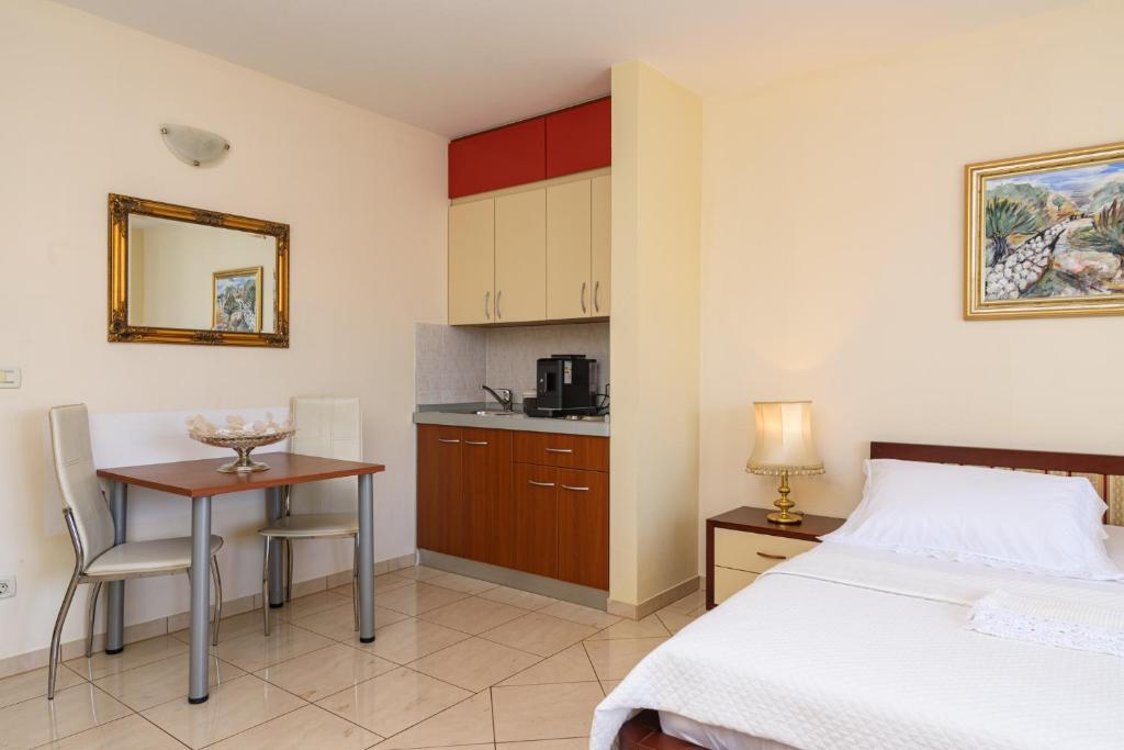 Kuchyňa alebo kuchynka v ubytovaní Apartments Jozic