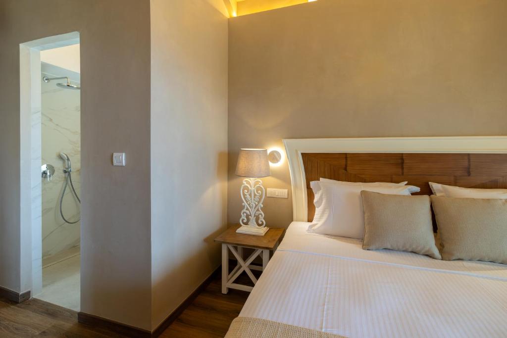 Postel nebo postele na pokoji v ubytování Zeus Luxury Villas - Villa Poseidon