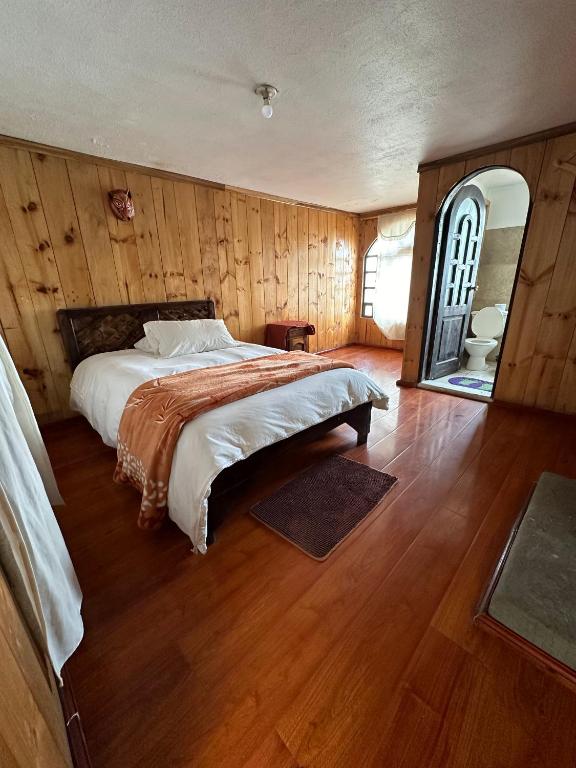 Postel nebo postele na pokoji v ubytování Cabañas Quilotoa