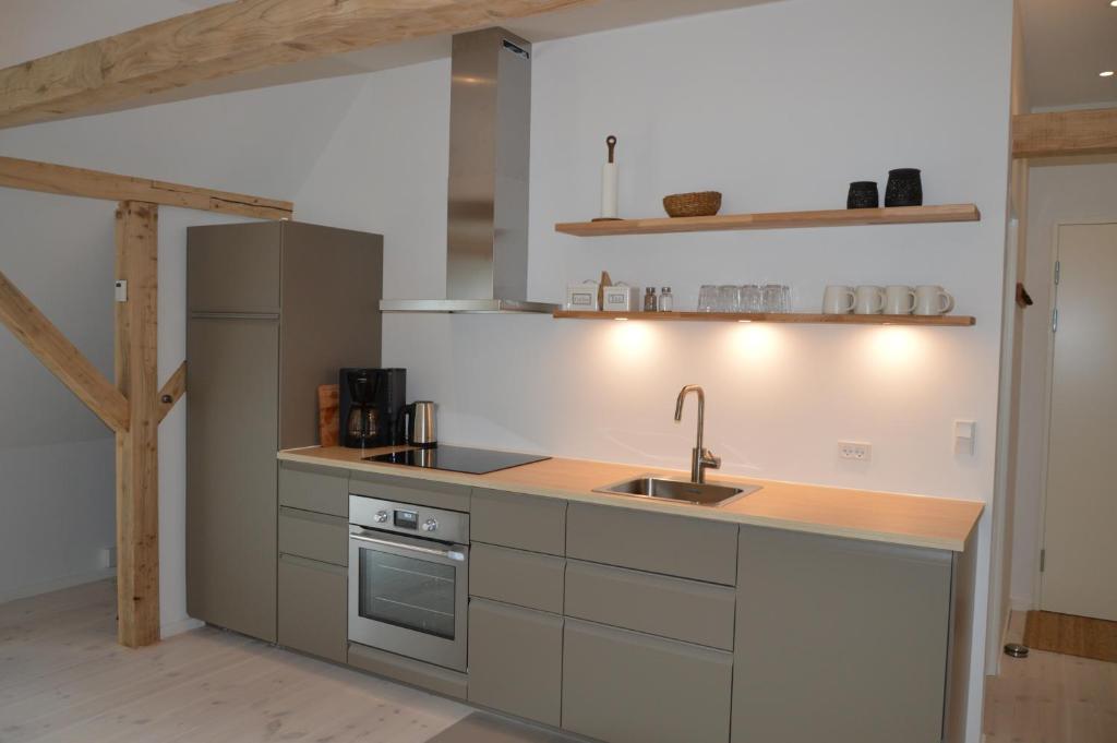 Kuchyň nebo kuchyňský kout v ubytování Svendlundgaard Apartments