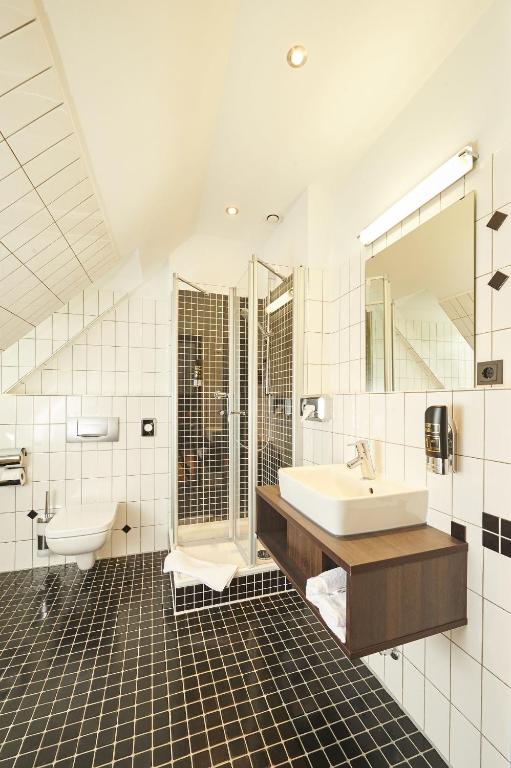 Koupelna v ubytování Hotel Hauser Boutique