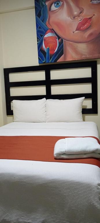 Postel nebo postele na pokoji v ubytování Hotel Castillo Del Rey