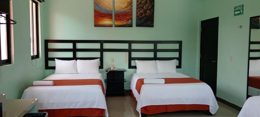 Postel nebo postele na pokoji v ubytování Hotel Castillo Del Rey