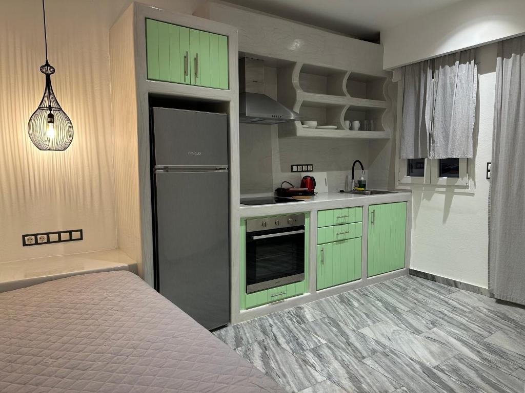 Kuchnia lub aneks kuchenny w obiekcie Aphrodite Hotel & Apartments