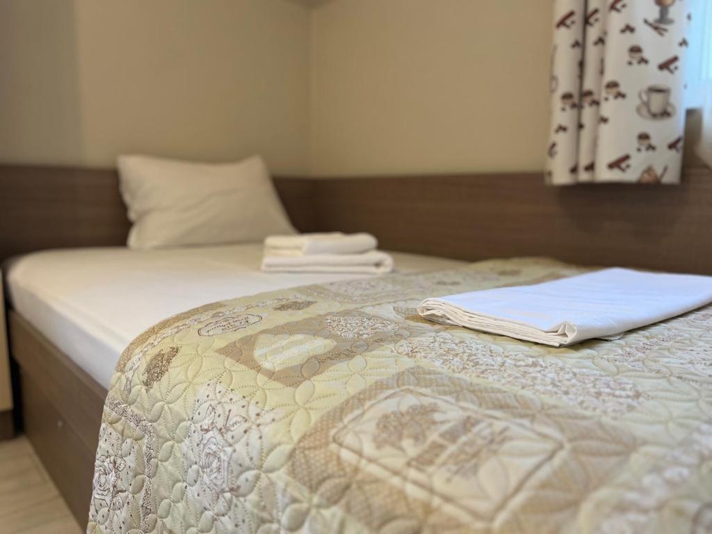 Postel nebo postele na pokoji v ubytování Хостел Атлас - Hostel Atlas