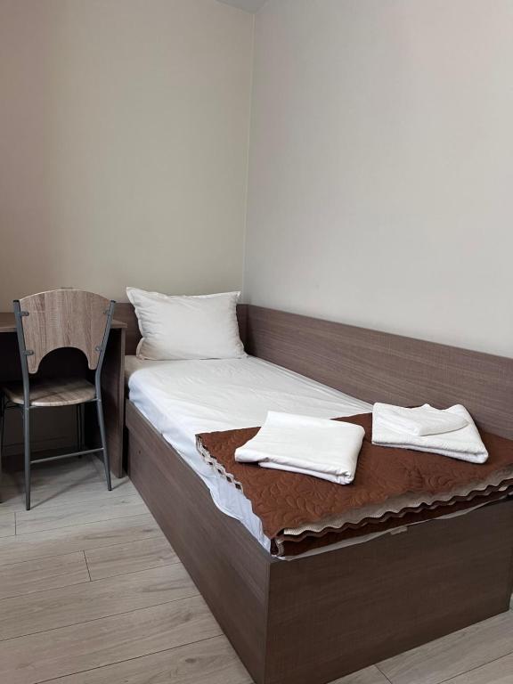 Postel nebo postele na pokoji v ubytování Хостел Атлас - Hostel Atlas