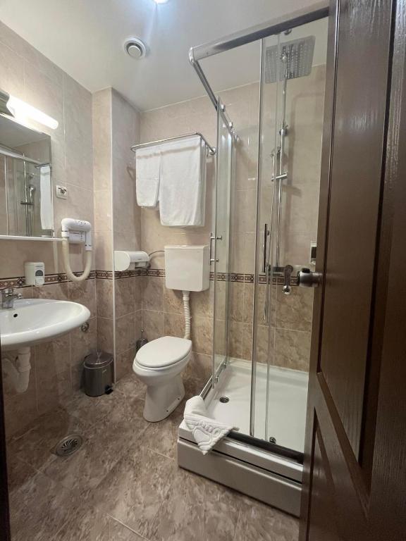 Koupelna v ubytování Hotel Elegance