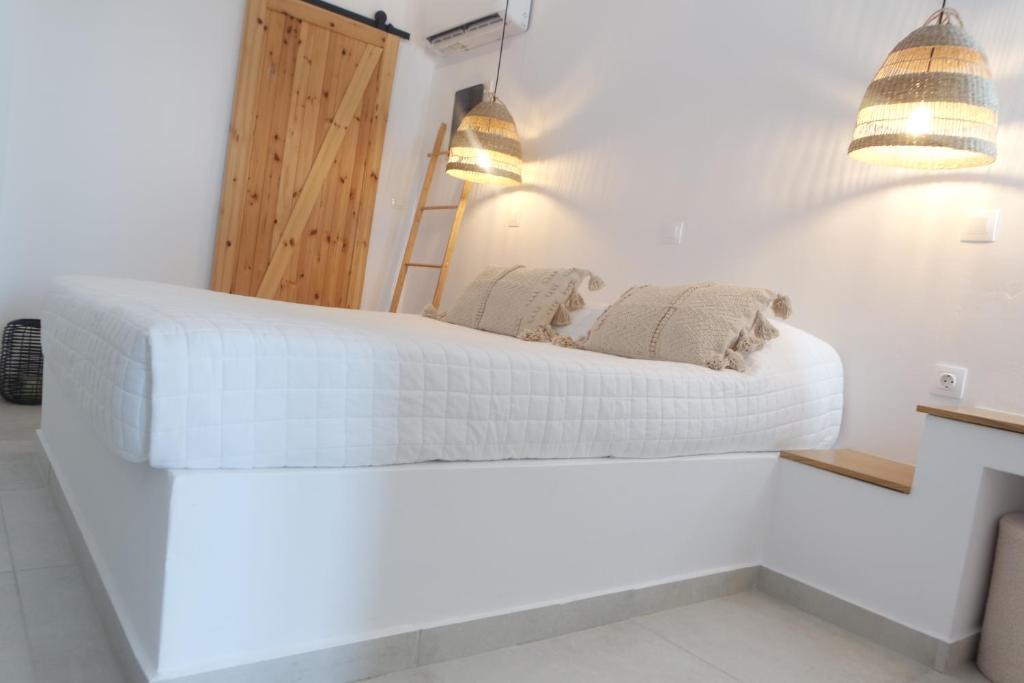 Postel nebo postele na pokoji v ubytování Sea view deluxe studios
