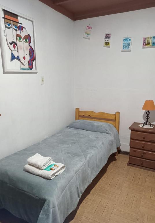 Postel nebo postele na pokoji v ubytování Tangohogar