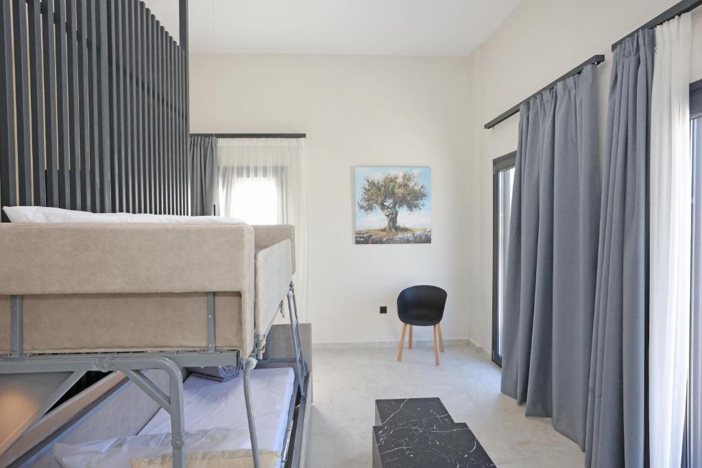 Гостиная зона в Caldera Suites "Ελιά"