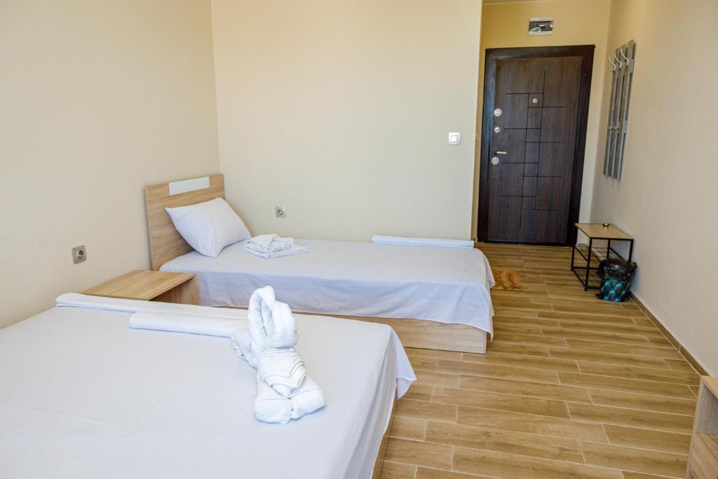 Postel nebo postele na pokoji v ubytování Silitur Central
