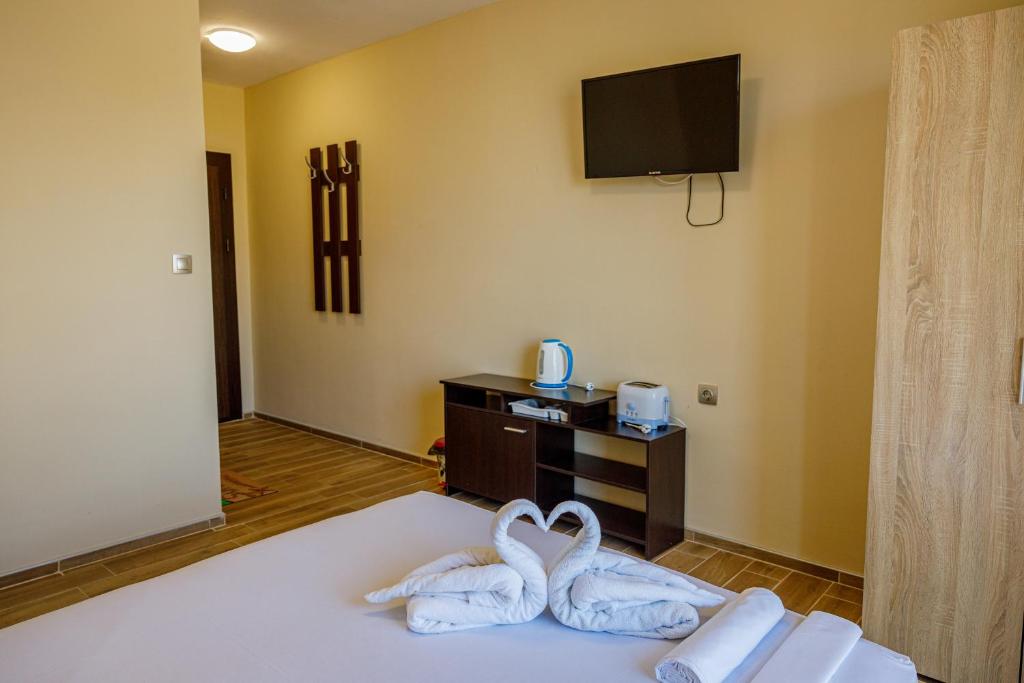 Postel nebo postele na pokoji v ubytování Silitur Central