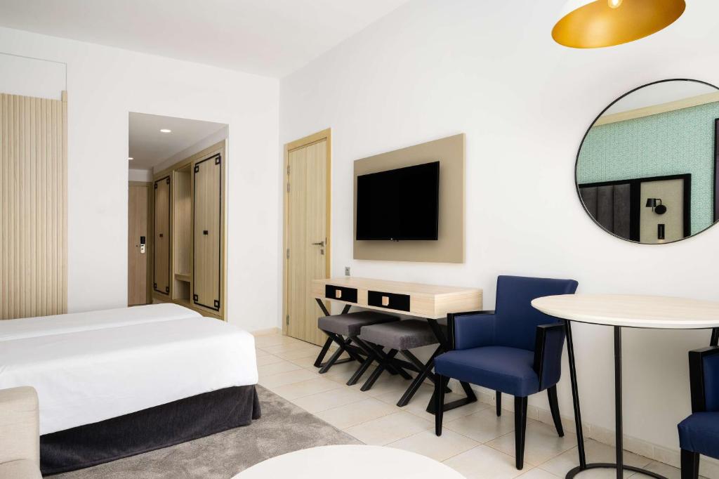 TV a/nebo společenská místnost v ubytování Radisson Blu Resort Saidia Beach