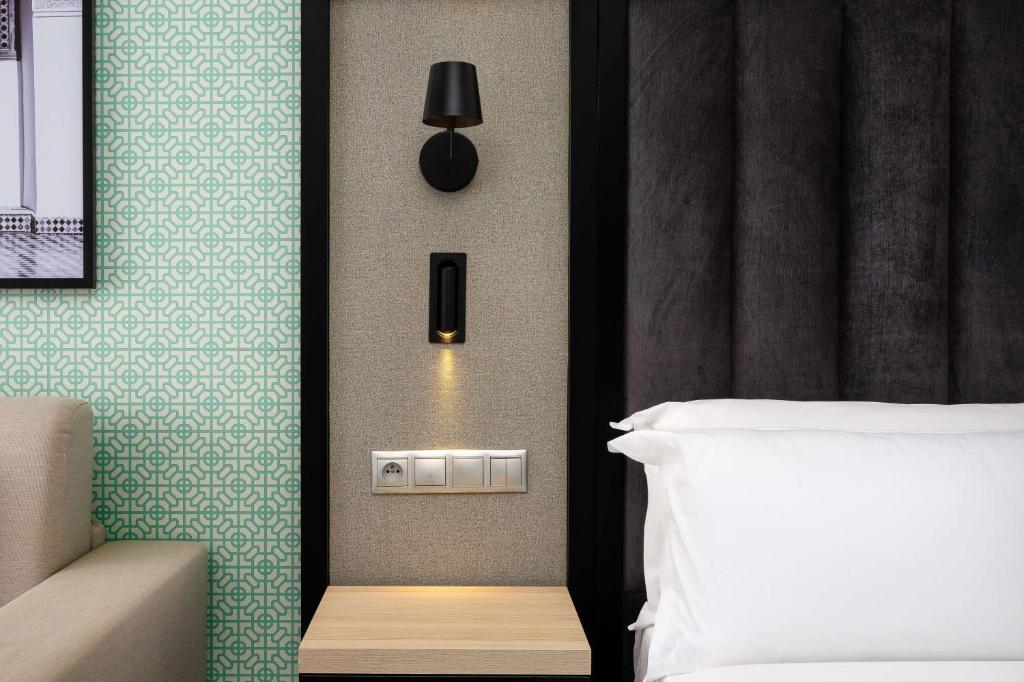 Postel nebo postele na pokoji v ubytování Radisson Blu Resort Saidia Beach
