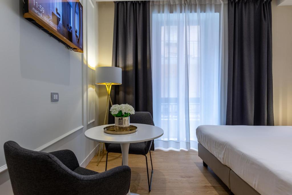 Postel nebo postele na pokoji v ubytování Casa Lounge Costituzione