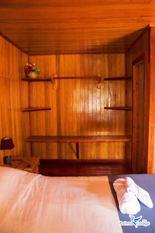 Postel nebo postele na pokoji v ubytování Cabañas Palma Sky Lodge