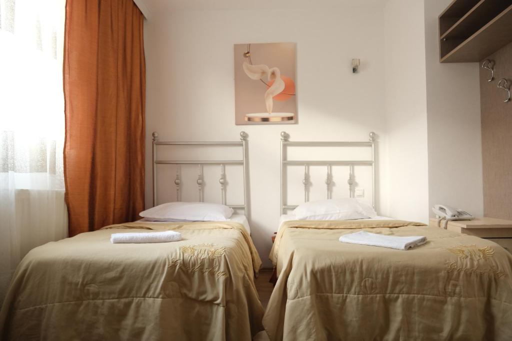 Postel nebo postele na pokoji v ubytování Hotel Sara & SPA