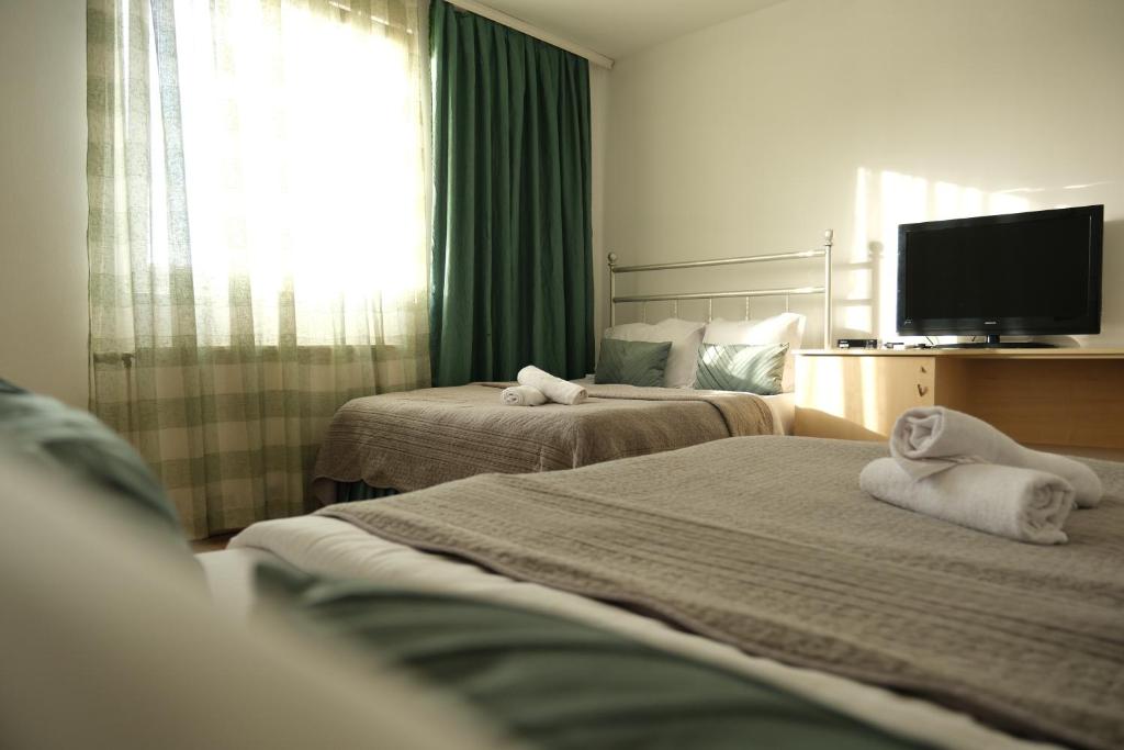 Postel nebo postele na pokoji v ubytování Hotel Sara & SPA