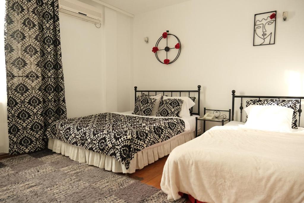 Postel nebo postele na pokoji v ubytování Hotel Sara & SPA