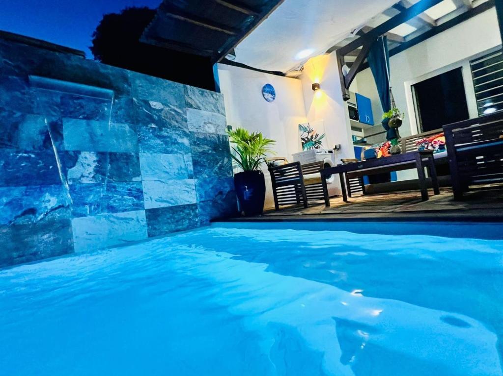 Bazén v ubytování Zandoli piscine, vue mer, paisible, jardin nebo v jeho okolí