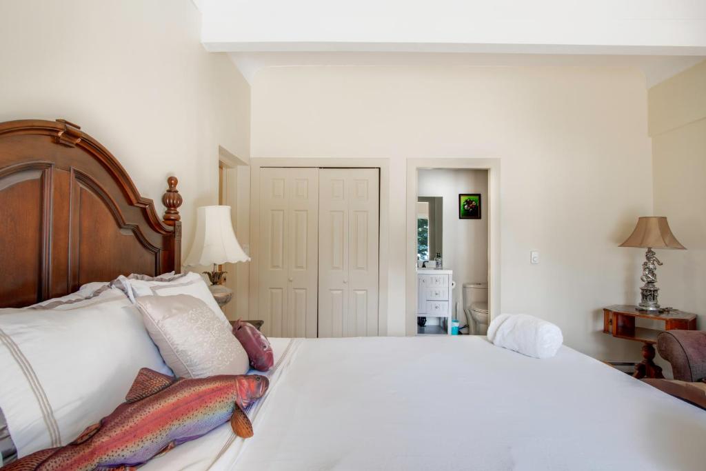 Ένα ή περισσότερα κρεβάτια σε δωμάτιο στο Oceanfront Getaway
