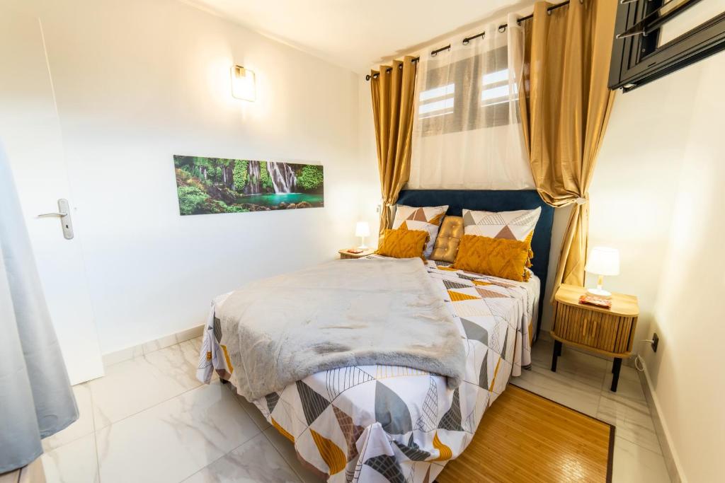 Postel nebo postele na pokoji v ubytování La Suite Golden