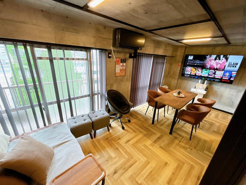 TV a/nebo společenská místnost v ubytování Base605