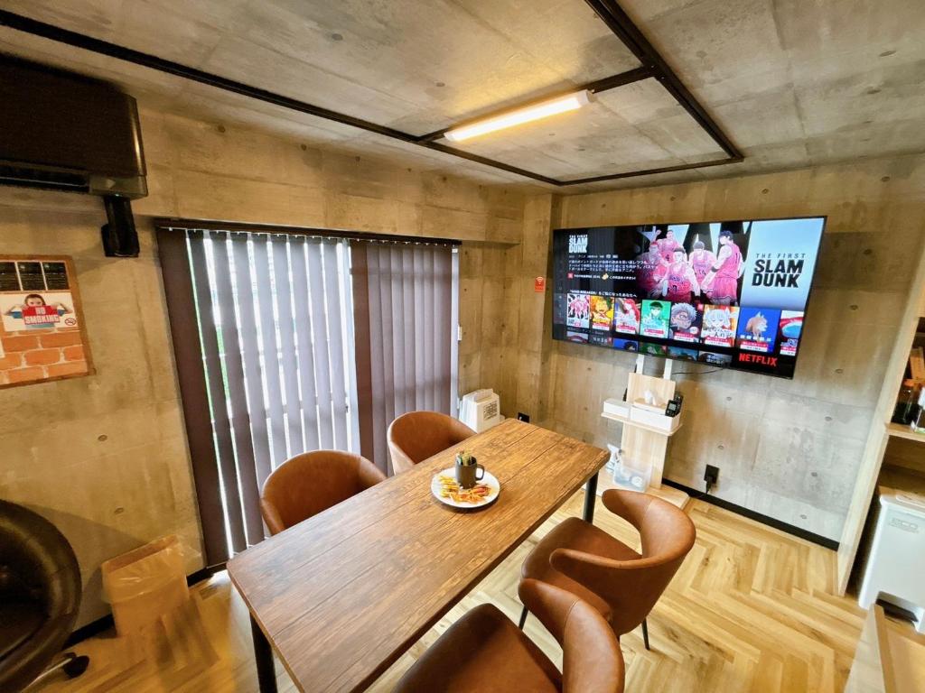 TV a/nebo společenská místnost v ubytování Base605