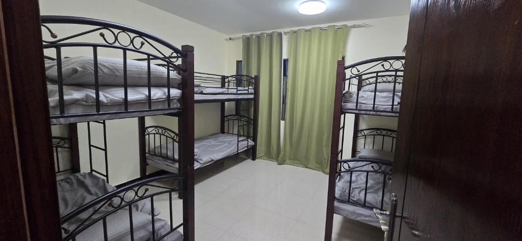 Postel nebo postele na pokoji v ubytování Olaando Hostel