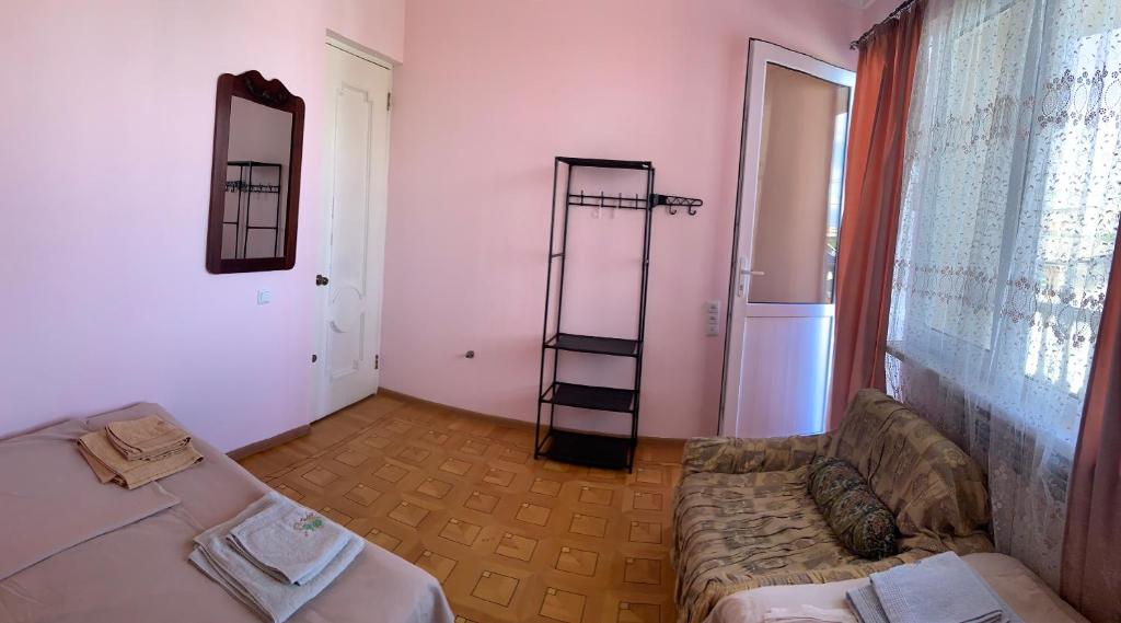 Postel nebo postele na pokoji v ubytování Guest House Lilia