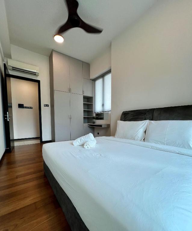 Postel nebo postele na pokoji v ubytování Opus Residence KL by EUcation Home