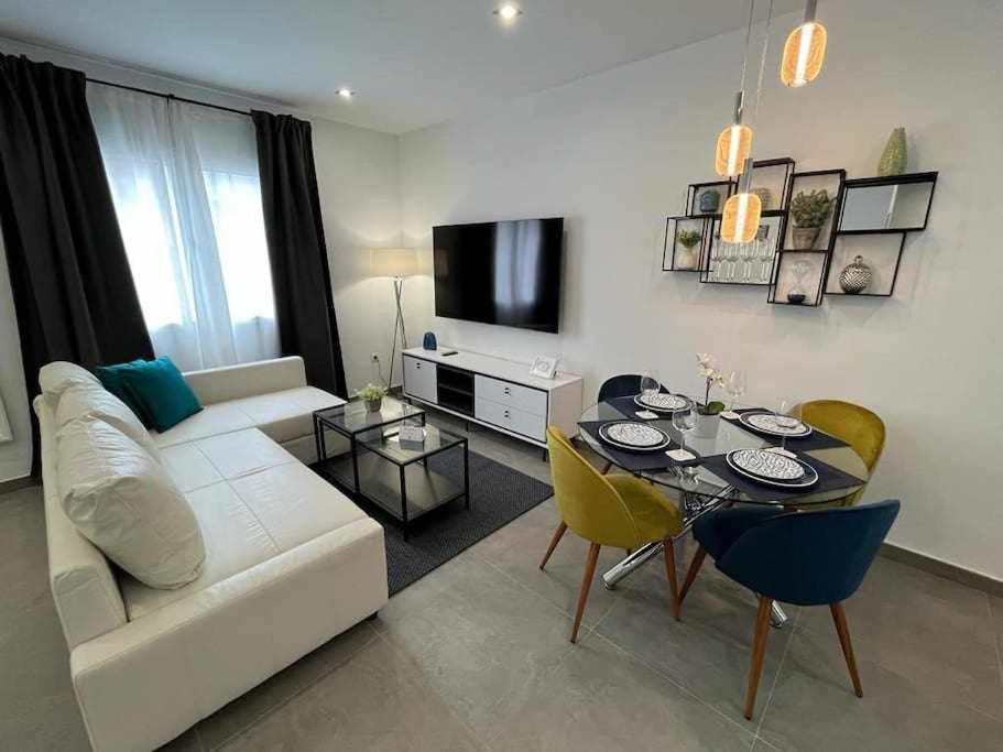 Et tv og/eller underholdning på XXI E Apartamentos Morales & Arnal