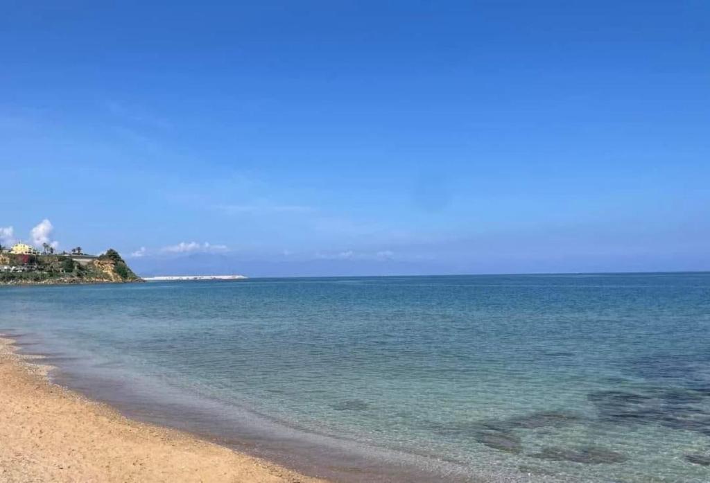 a view of the ocean with a sandy beach at Casa di Pippo in Trappeto