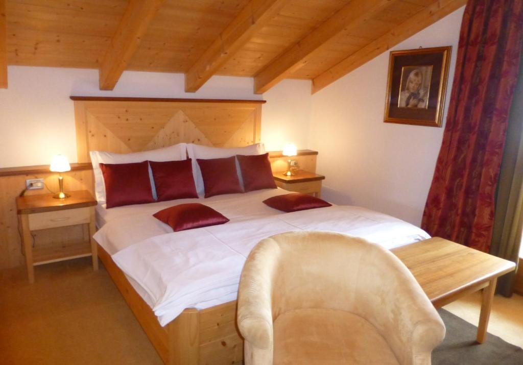 Postel nebo postele na pokoji v ubytování B&B Tamarindo