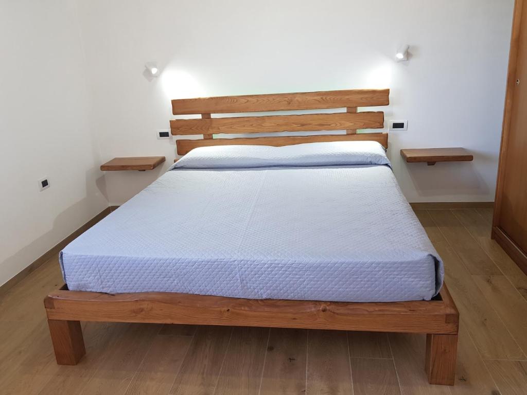 Postel nebo postele na pokoji v ubytování Nova Rooms