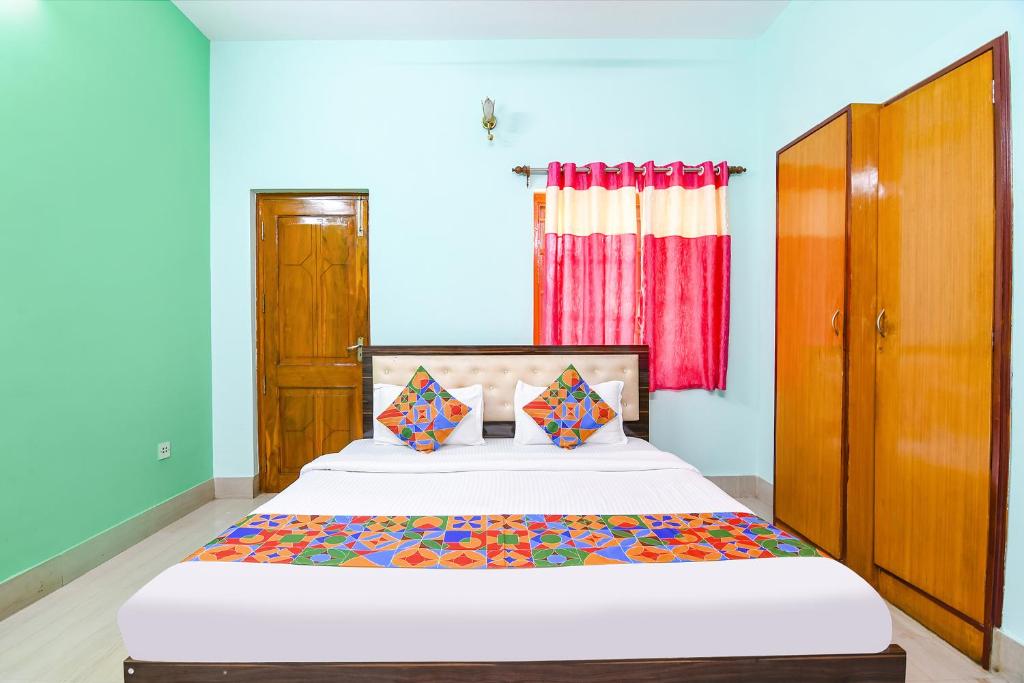 Postel nebo postele na pokoji v ubytování FabHotel Vicky
