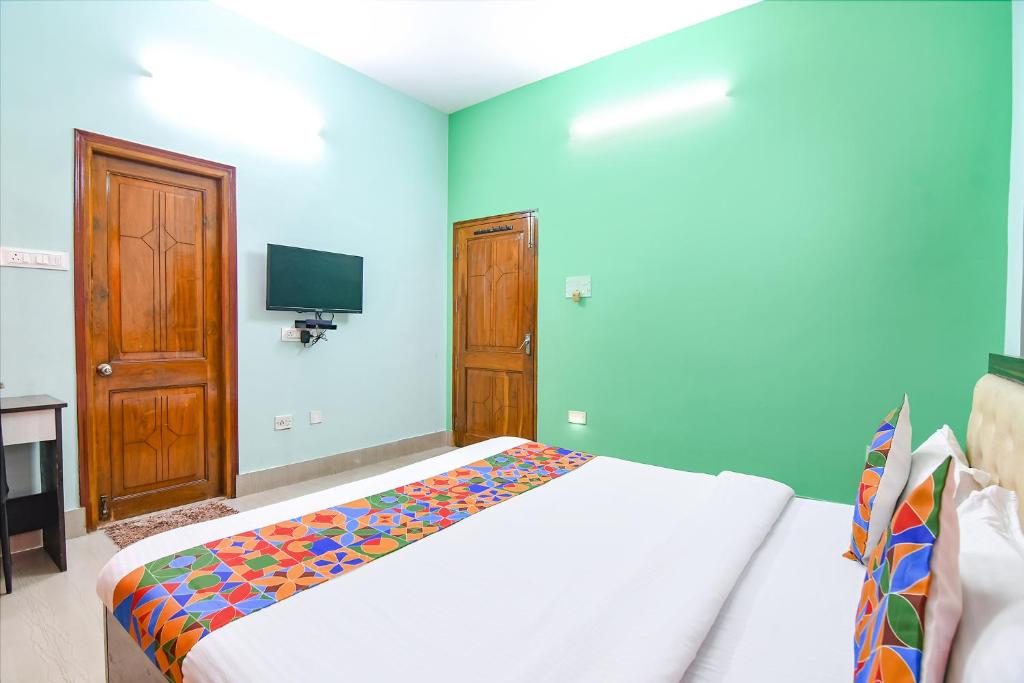 Postel nebo postele na pokoji v ubytování FabHotel Vicky