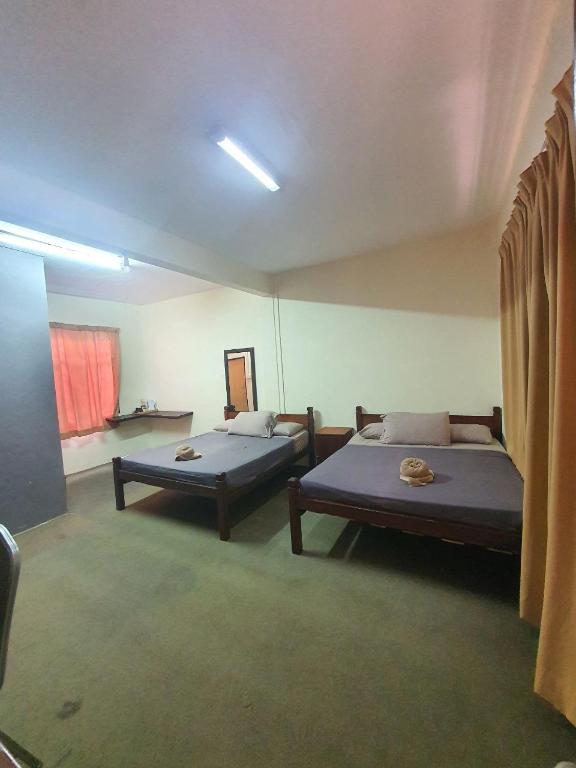 Postel nebo postele na pokoji v ubytování NKS Chalet