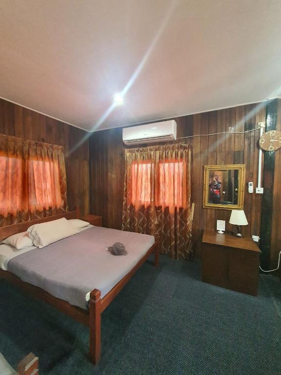 Postel nebo postele na pokoji v ubytování NKS Chalet