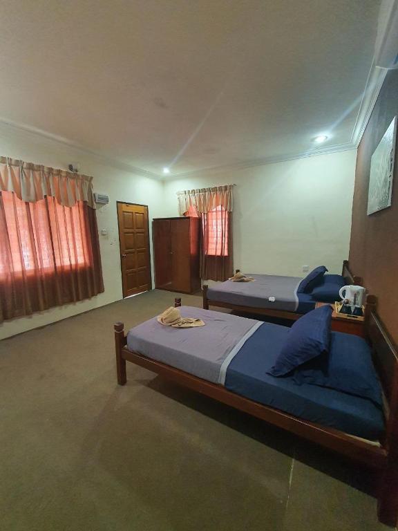 Postel nebo postele na pokoji v ubytování NKS Chalet