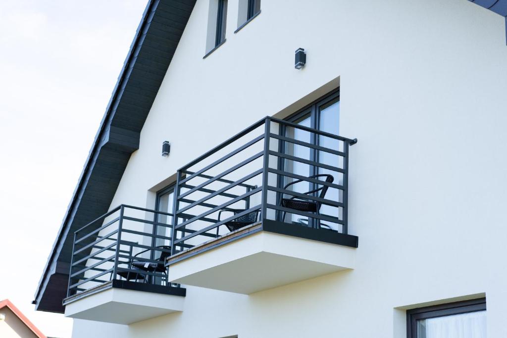 Balkón nebo terasa v ubytování Pokoje Gościnne Fuksja