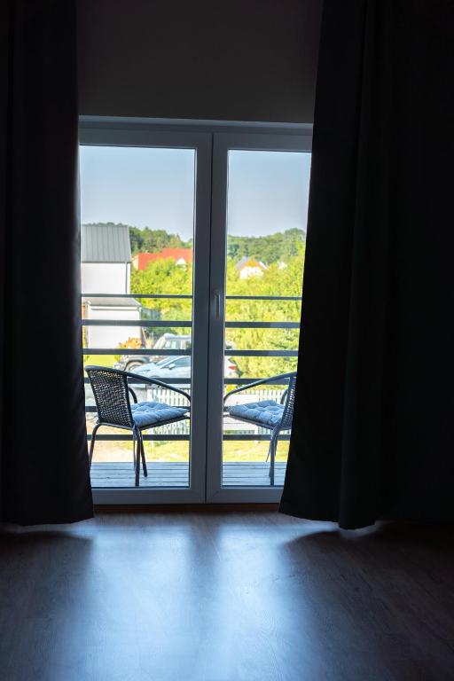 Balkón nebo terasa v ubytování Pokoje Gościnne Fuksja