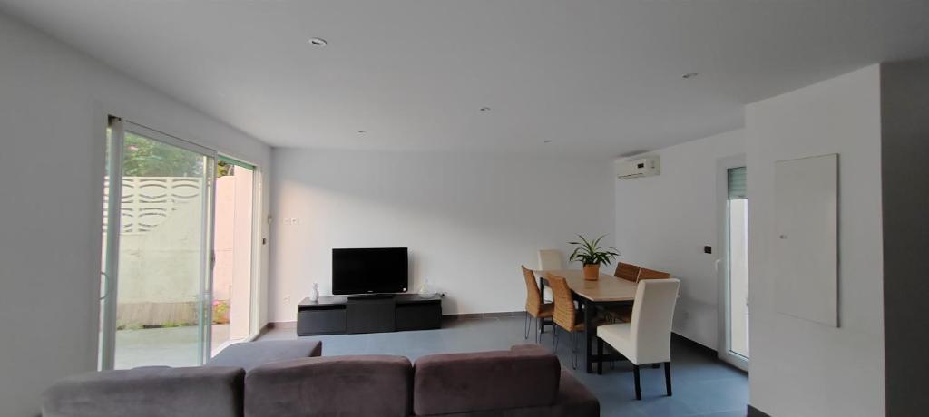 Ein Sitzbereich in der Unterkunft Maison de vacances