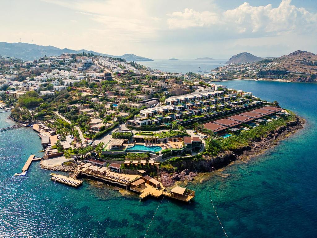 an aerial view of a resort on the water at Root Redrock Villas Yalıkavak in Yalıkavak