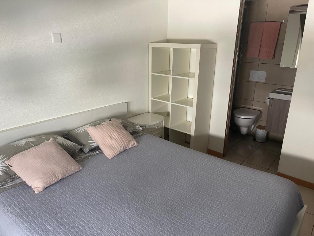 Postel nebo postele na pokoji v ubytování Appartamento di 45mq a Balerna
