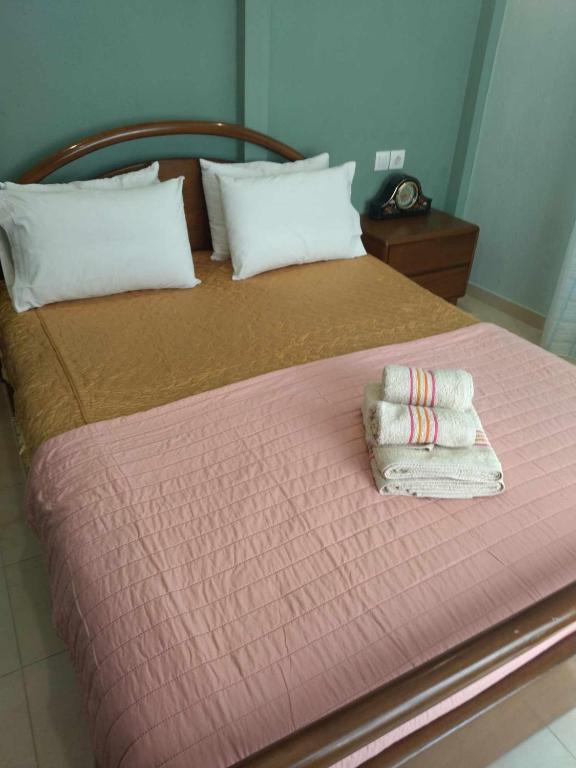 Postel nebo postele na pokoji v ubytování kaite house